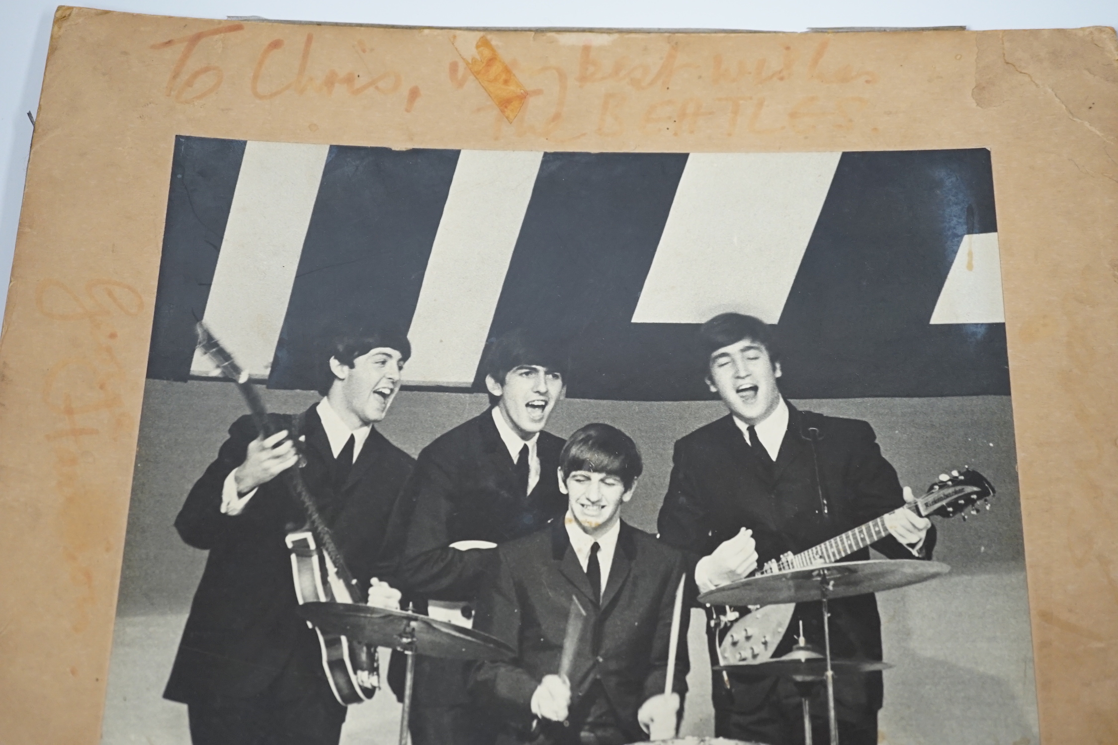 A fully signed mid-1960s The Beatles photo, signed to the original mount to which the photograph is glued